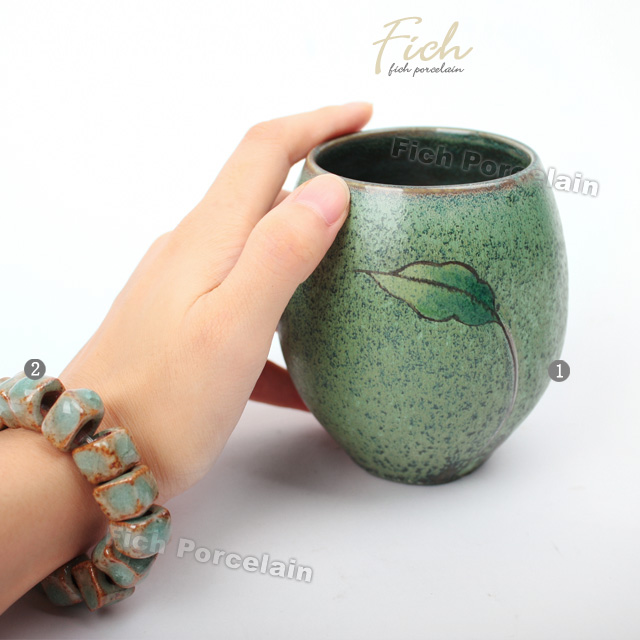 典雅的青铜墨叶陶瓷手工杯