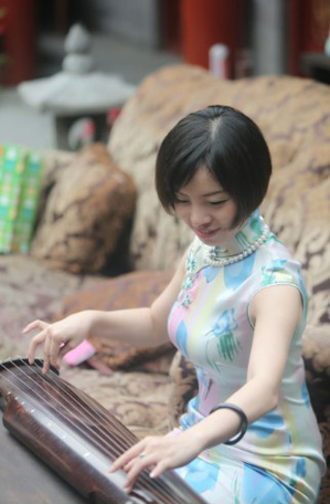 旗袍设计师喻双双和她的经典旗袍